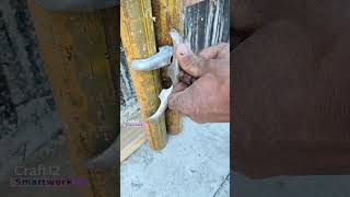 Securing Steel Pipes with Wing Nut Clamps