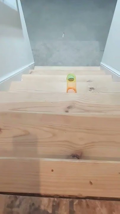 How To Make A Slinky Go Down Stairs #shorts how to make a slinky go down stairs - YouTube