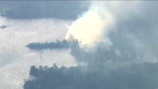 Crews continue to battle wildfires in northern MN