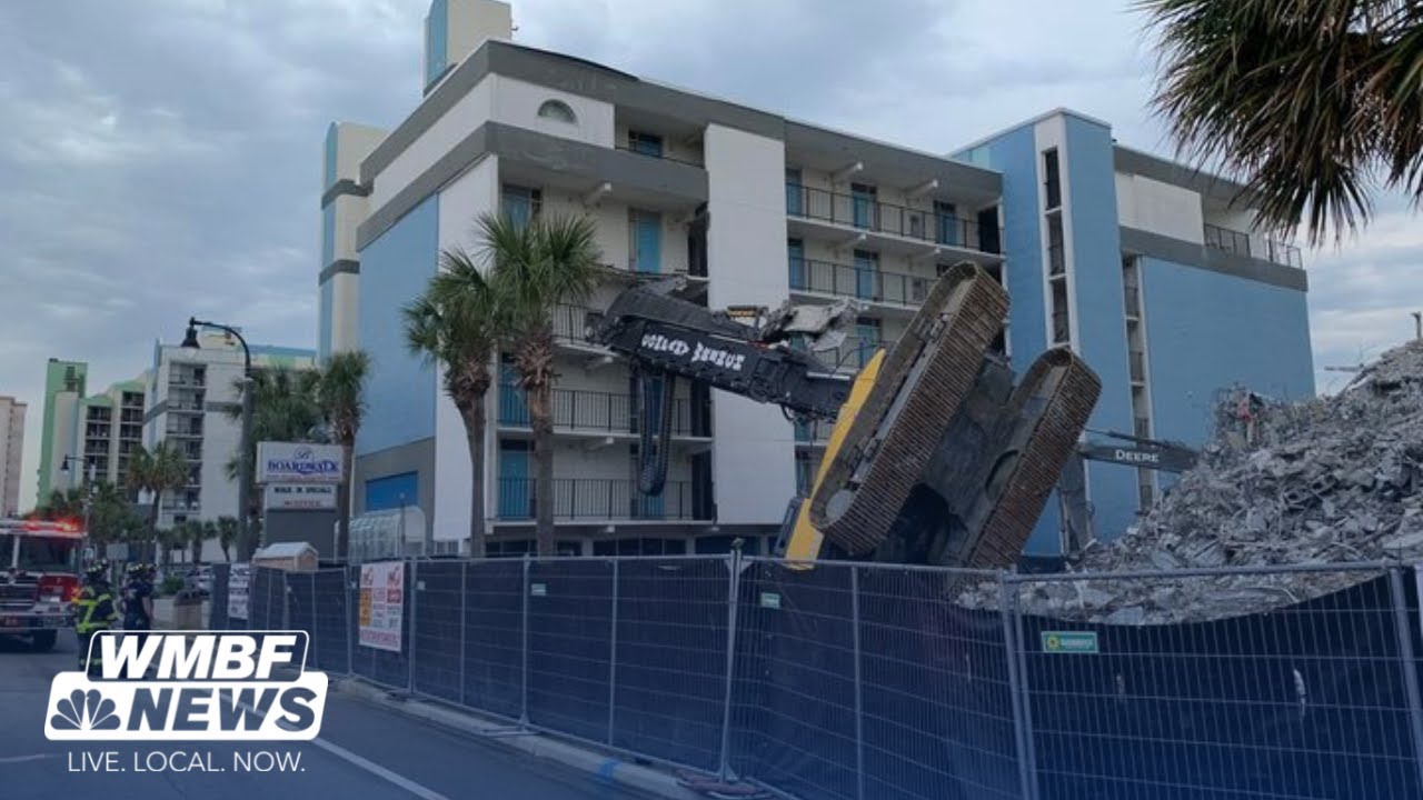 Excavator overturns during construction, crashes into Myrtle Beach ...