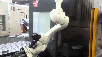 RFA Kawasaki RS020N Robotloader loading a Haas UMC 750 5 axis milling machine