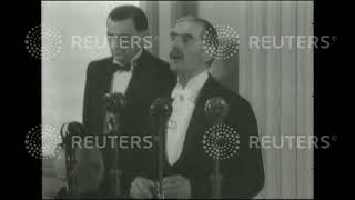 1938 British Prime Minister Neville Chamberlain delivers speech at 50th anniversary banquet
