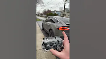 DRIVING A TESLA WITH A PS4 CONTROLLER Shorts 