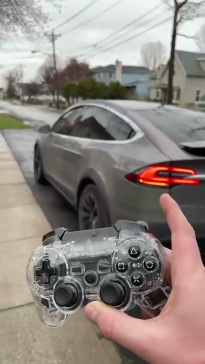 DRIVING A TESLA WITH A PS4 CONTROLLER! - #shorts