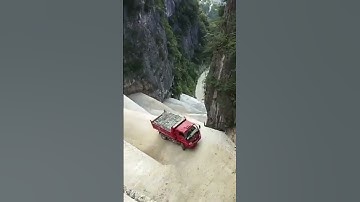 Engineering  Mountain road with a very steep slope Sharp bend in road #engineering #civilengineer