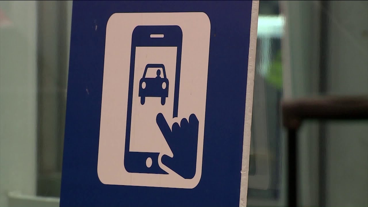 newspaper mockup Ride share lot at O'Hare shut down due to congestion