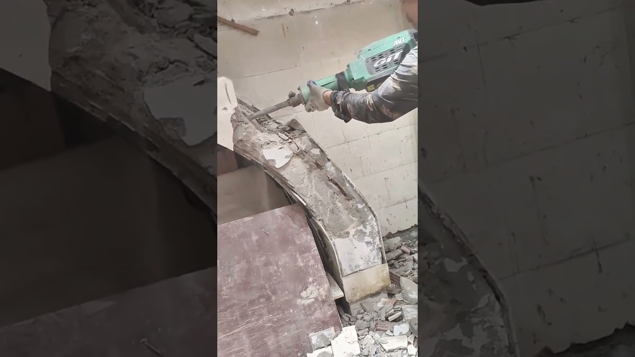 Breaking Concrete Wall Using Heavy Duty Demolition Hammer