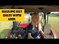 Hauling hay bales with Abbi.  26 06 20