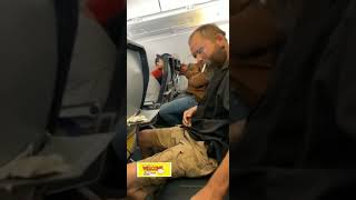 PASSENGERS IN A PANIC AS MAN LIGHTS A CIGARETTE IN THE MIDDLE OF AN AEROPLANE