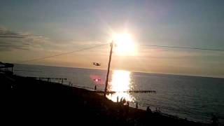 A plane over the beach that i passed by with my trojan in the next movie
