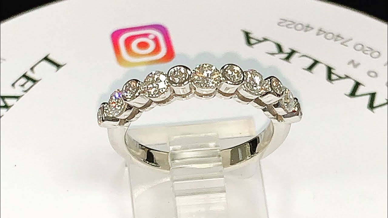 A totally custom bespoke diamond engagement ring. Not the traditional style you’re expecting!