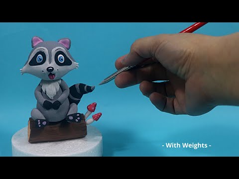 Fondan veya kilden yapılmış tatlı ve sevimli rakun Cake Topper