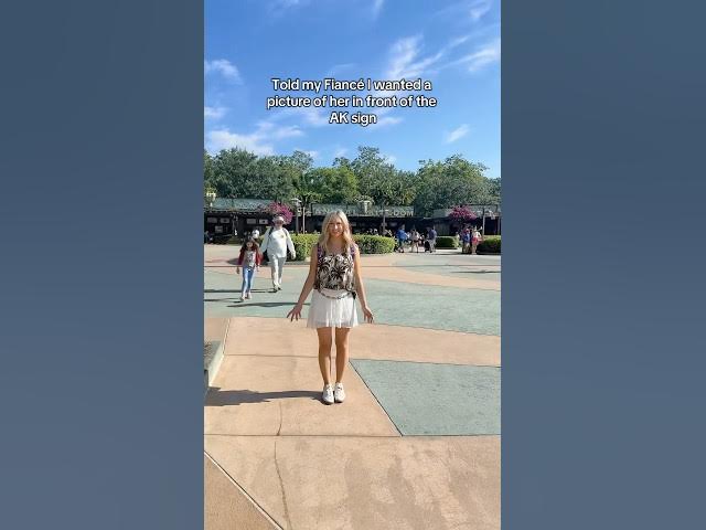 Told my fiancé I wanted a picture of her in front of the AK sign 😂 #couple #prank