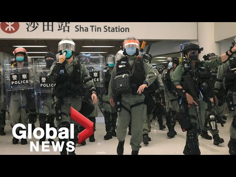 Hong Kong protests: Police storm shopping mall to disperse demonstrators on May Day