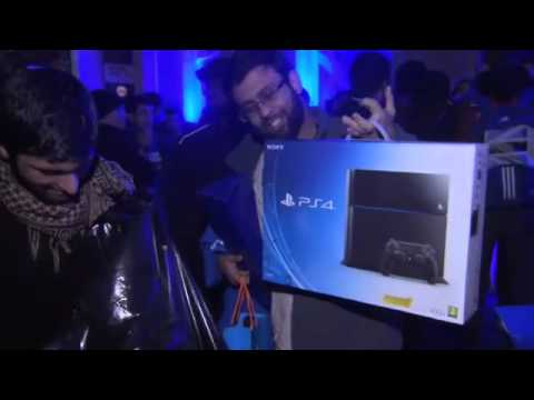 PS4 Launch  UK Fans Snap Up New PlayStation