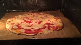 Pizza baking in the oven (Time lapse)