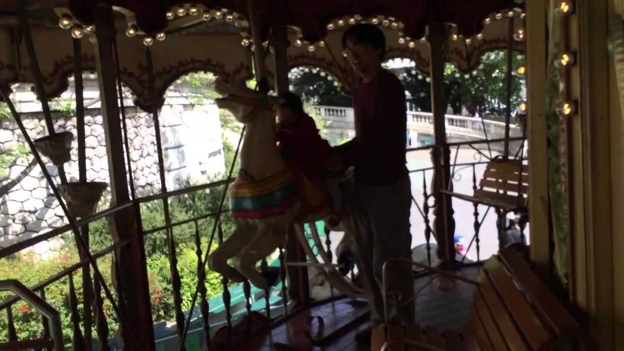 Baby on merry go round at Montmarte