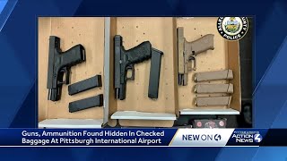 Man charged after 3 guns found hidden in briefcase at Pittsburgh International Airport