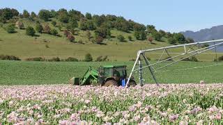 Reinke Center Pivot Towing through Field