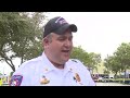 15 hurt when passenger train strikes fire truck that drove into crossing after freight train passed
