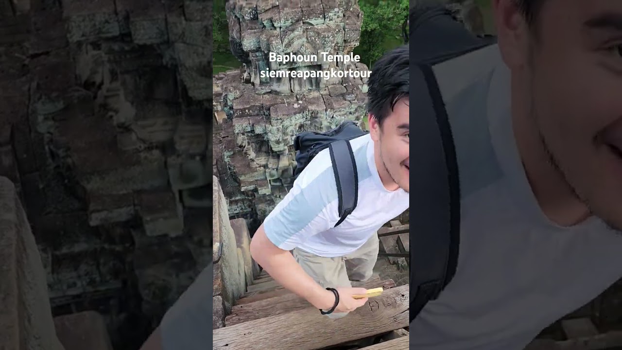 Climbing Baphoun Temple Anglor Thom Capital