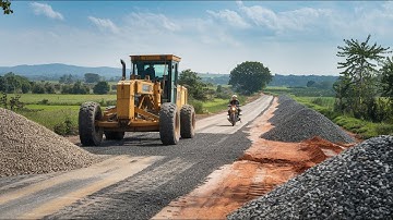 Amazing motor grader operating on a road foundation and spreading crushed gravel with precision