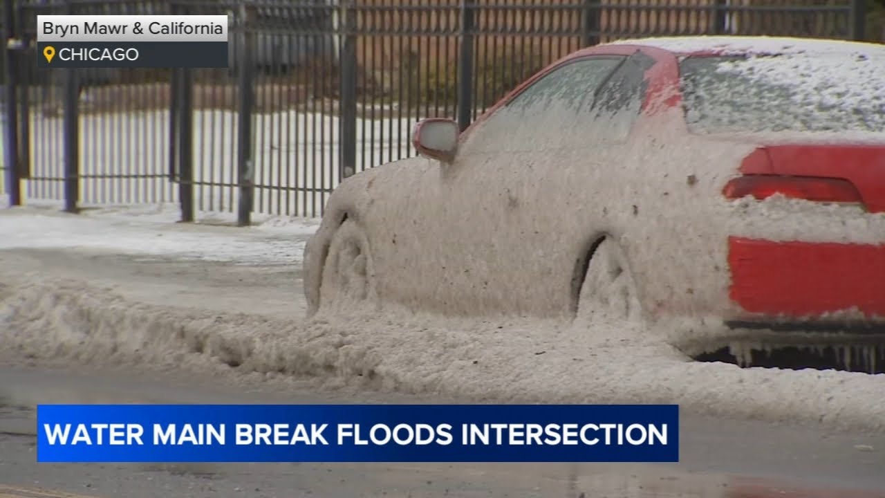Water main break floods Chicago North Side intersection - YouTube