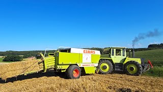 Hochkarätiger Oldtimer MB trac 1500 wie ein Stier beim Strohpressen mit Claas Quadrant 1200 RC