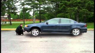 Car lift  VFX composite by John Heitshu - 2011