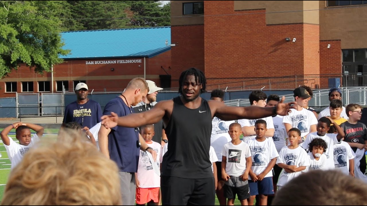 New Orleans Saints fullback, Alex Armah Jr., hosts his first youth football camp in Dacula