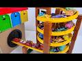 車のおもちゃ☆TAYOガレージ&スパイラルコース☆We raced the toy car that came out of the TAYO garage along a spiral track
