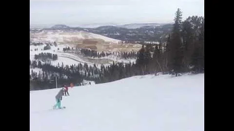 Stacie snow boarding at Wild Mountain