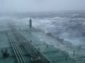 Large super tanker ship in huge storm in atlantic oceanmpg