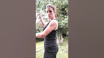 Garden Girl Using The Garden Rake 