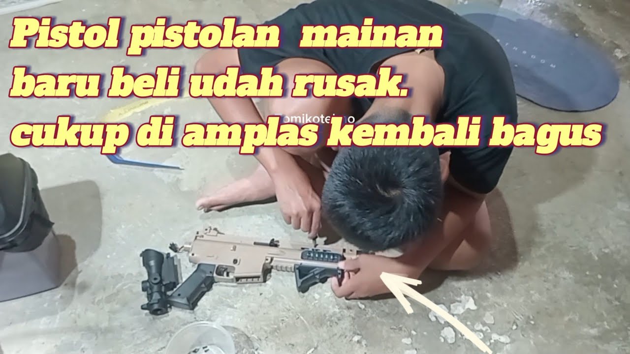 Perbaiki pistol-pistolan mainan anak