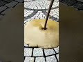 Paving joint filling method leveling cement between stone blocks"