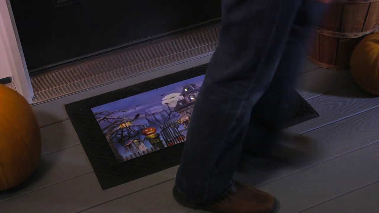 Haunted House Door Mat with Lights & Music (41MBL2402) from Evergreen Flag