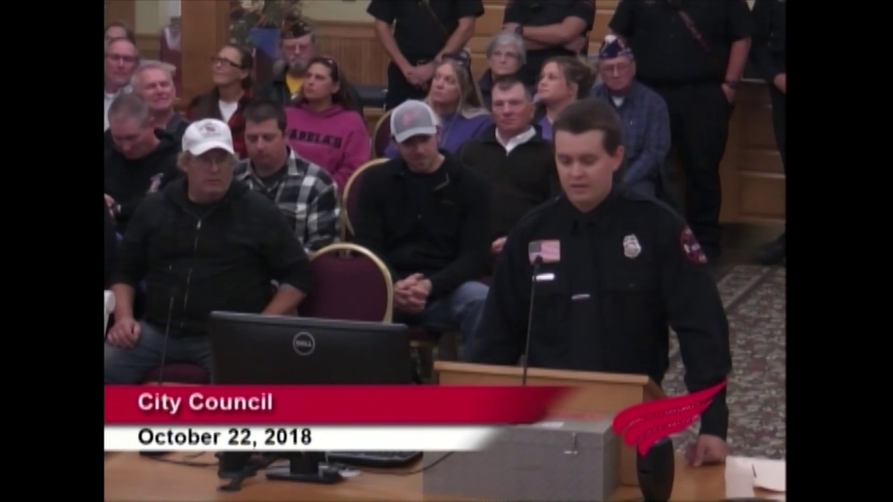 Badge Pinning of Firefighter Paramedic Nic Swanson