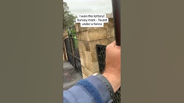 Surveyor finds survey mark under fence  #shorts