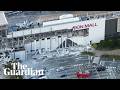 Aerial footage shows collapsed buildings after 7.1 magnitude Japan earthquake