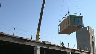 Modular home mixed-use development project deploys first Detroit homes