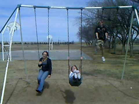 On the swings with Becca Shannon and Dylan