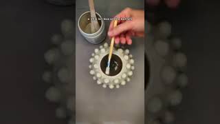 Ceramic artist shows how she glazes a decorative vase!