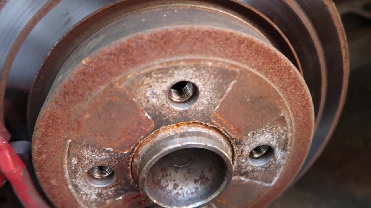 How to Replace a Rear Brake Pad and Rotor (Part 1) - YouTube