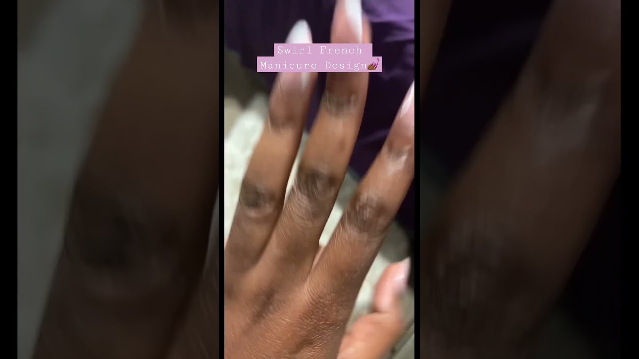 Nail inspo. French manicure set with a swirl design. Almond nail set. 