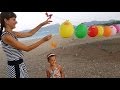 Kafada içi dolu balon patlatmaca , eğlenceli CHALLENGE video