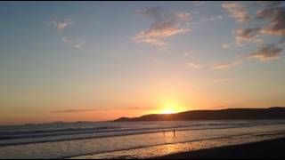 Sun setting over Newgale beach, Pembrokeshire.