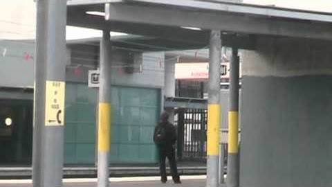 Howth Junction-8121 Irish Rail Dart departs and 8521 arrives on service to Greystones