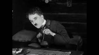 FUNNY Charlie Chaplin dancing with forks and bread