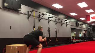 Broad jump to med ball squat throw